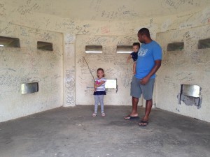 Kharron & the kids inside a lookout tower.