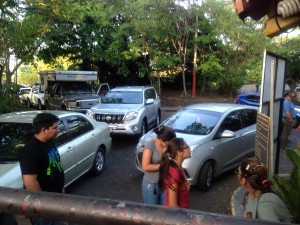 Cars all waiting for the gates at Masaya Volcano to open.