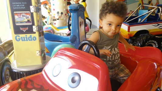 I think its time to introduce him to the movie "Cars". He loved this ride at the mall in Managua. Even after vaccine shots!